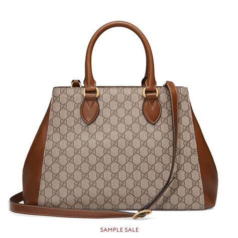 shopping donna gucci tessuto plastificato|Borsa shopping misura media in GG supreme .